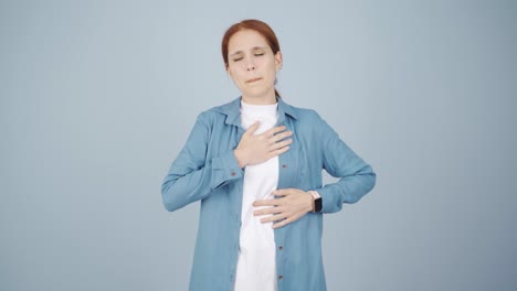 Woman-with-chest-pain.